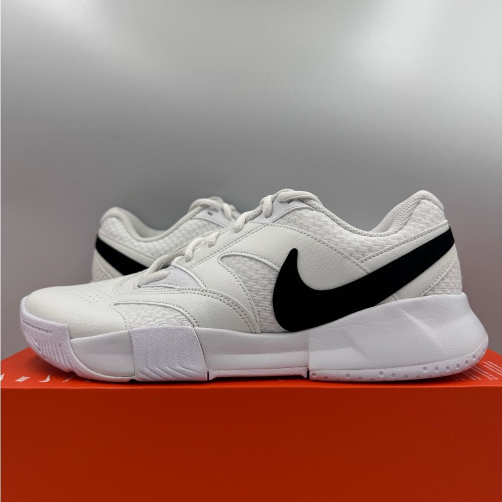 Nike Women's White Athletic Shoes with Black Swoosh